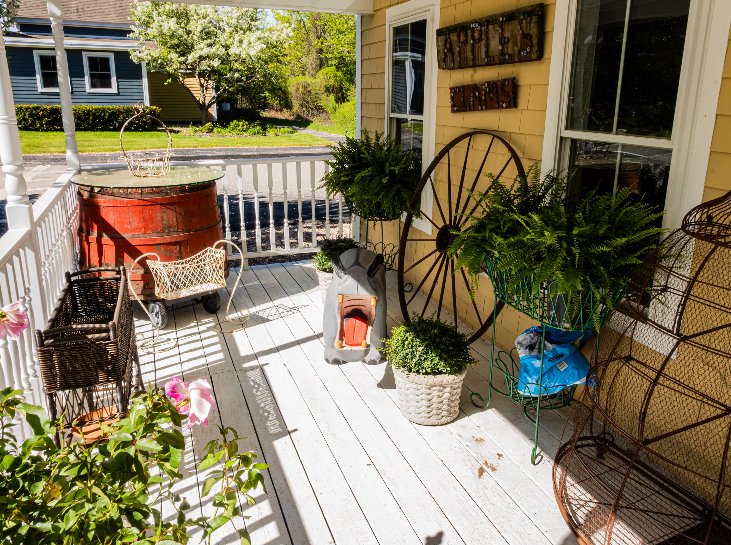 Antiques and porch displays outside The Dovetail Shop.